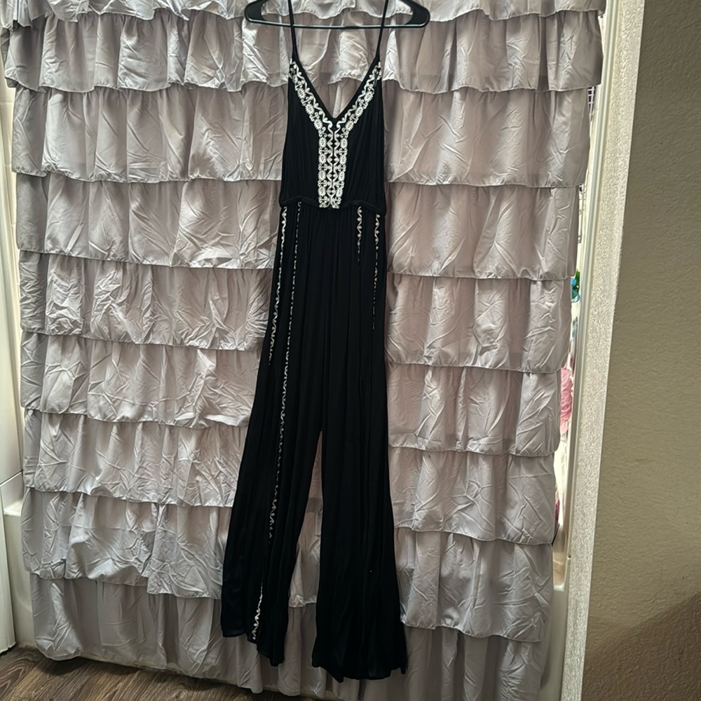 Black romper with white detailing